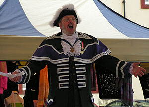 Town crier in tricorn hat