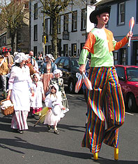 Stilt walker in the parade