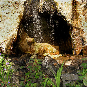 otter statue water feature