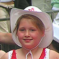 Smiling girl in cowboy hat