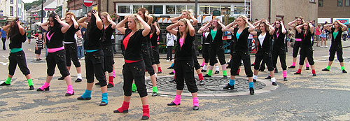 Dancers  posing on strand street