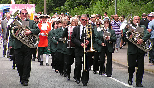 whitehaven brass band lead the carnival procession