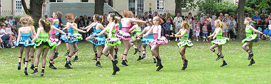 Girls dance in front of Whitehaven bandstand