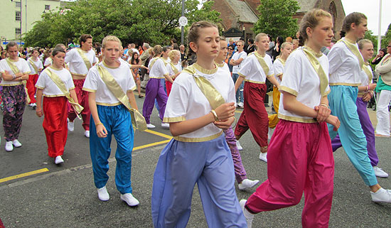 Colourful dancers with asian costumes on Lowther Street