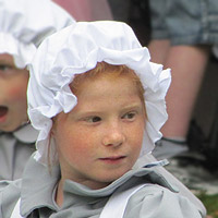 Girl in mob cap