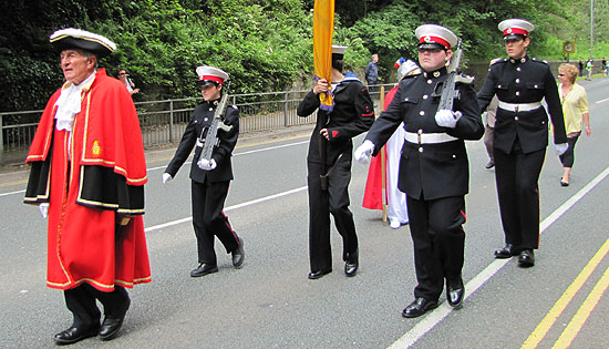 Town Crier Rob Ramano heads the carnival parade