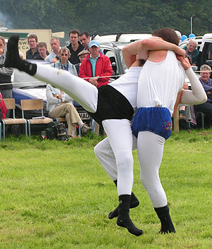 Cumberland wrestler being thrown