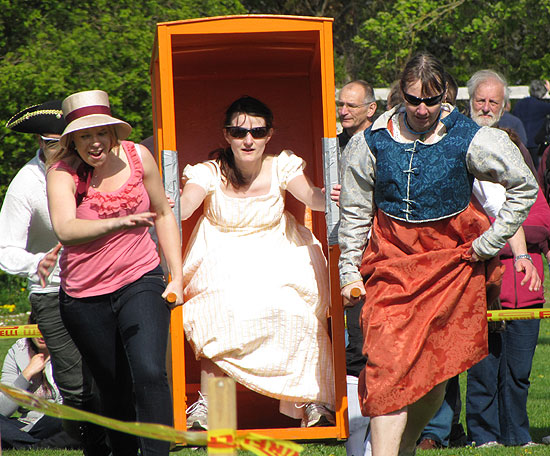 Ladies racing with sedan chair