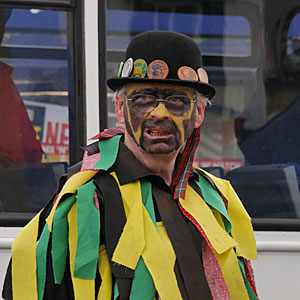 face-painted morris man