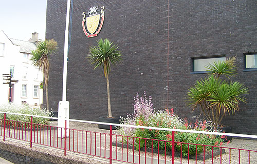 Side of Civic hall summer 2009 - potted palms