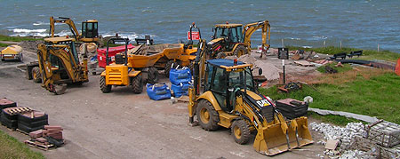diggers and dumper trucks at south beach
