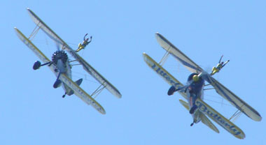 Biplane wing walkers at the festival