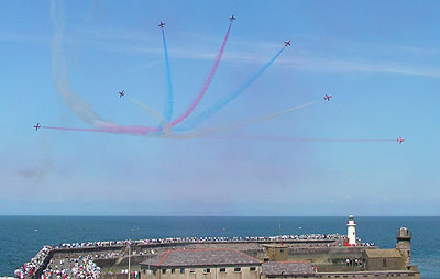 Red Arrows fan burst over the Whitehaven Harbour