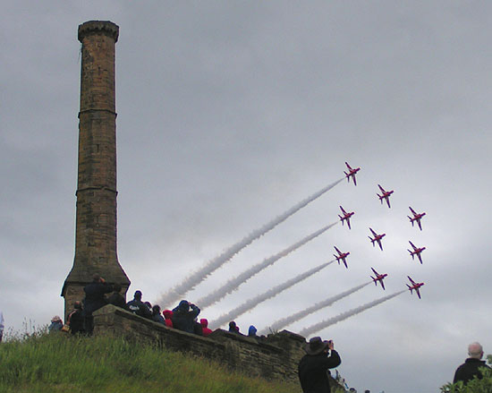 Red Arrows passing Whitehaven's Candlestick chimney