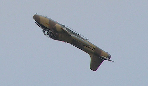 Strikemaster climbing in inverted position