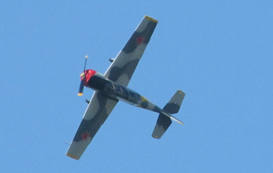 yak 52 looping overhead