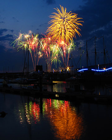 Coloured fireworks over Whitehaven harbour