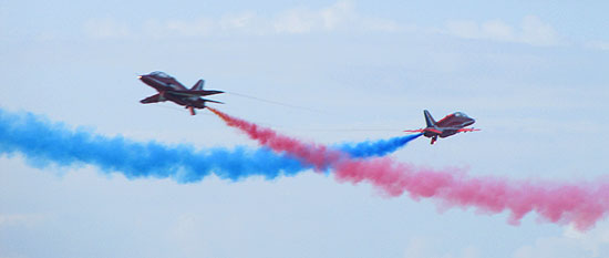 two Red Arrows cross