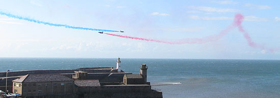 Red rrows above whitehaven pier