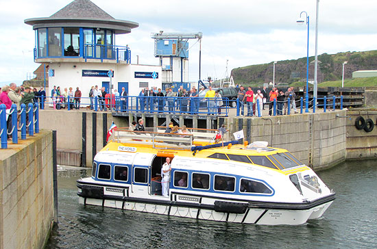 Entering the harbour on the tender from The World