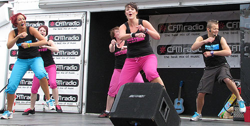 Zumba dancing on the CFM stage