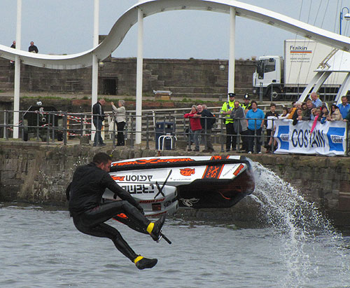 Jetski performs in front of wave feature