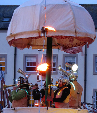 Brass players in strange costumes