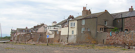 Smugglers cottages on the shore