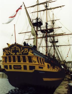 The stern of the Grand Turk with florid designs above the captains cabin