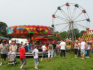 Funfair big wheel and roundabout