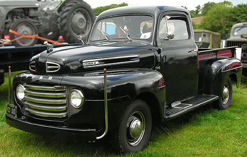 black Ford F1 pickup