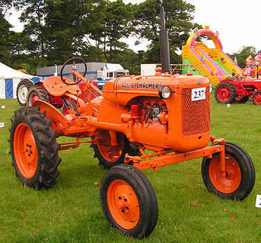 Orange coloured  Allis Chambers B type tractor