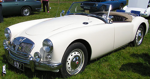 white MG Roadster at vintage rally